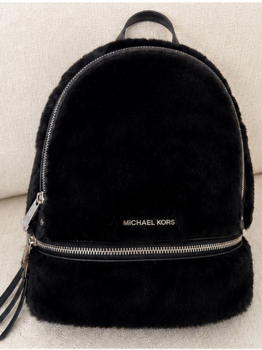 MICHAEL KORS Black Faux Fur Backpack with Silver Hardware.
